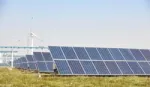 Solar panels and wind power, two key sources of green electricity used by Unilever