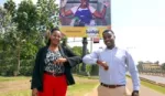 Unilever East Africa’s Home Care Director and Absa’s Director of Business Banking standing in front of a Sunlight billboard.