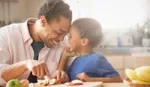 Father and son eating